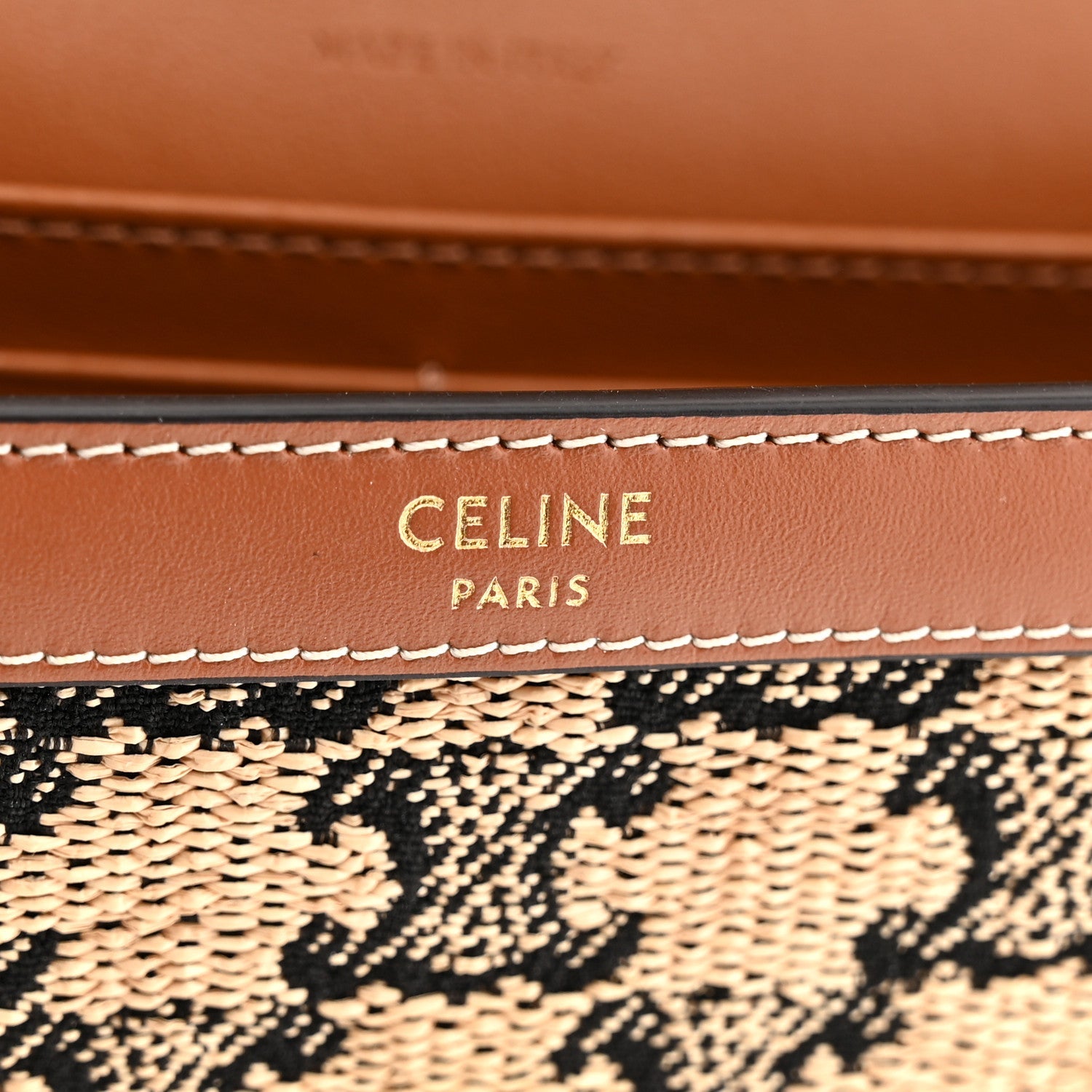 Tan leather panel with CELINE PARIS stitched detail above jacquard fabric
