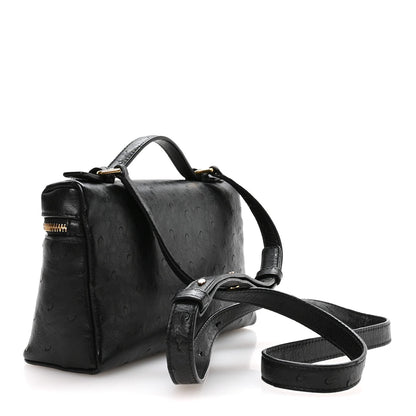 Black ostrich pocket pouch with two straps and gold-tone zipper detail