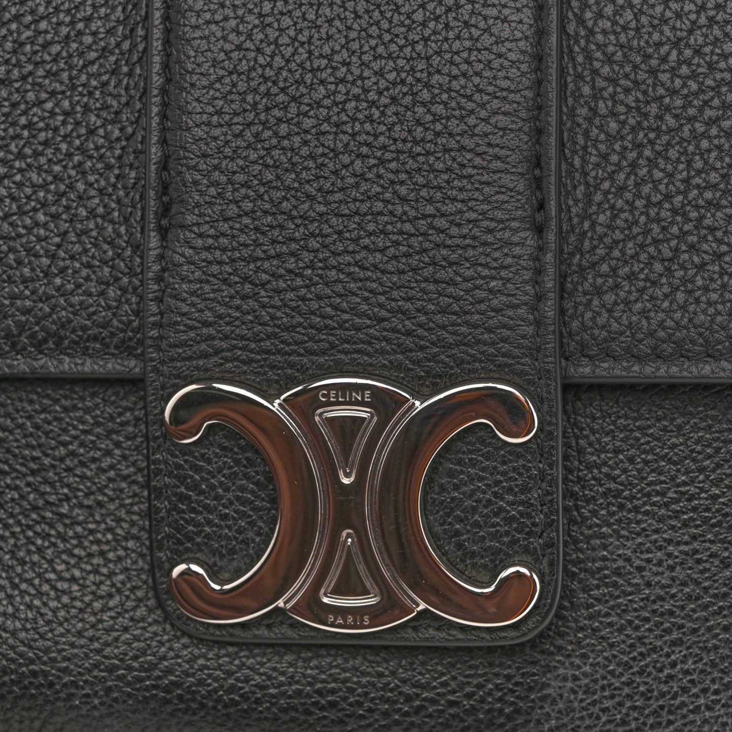 Black calfskin shoulder bag with silver Celine logo plaque at front