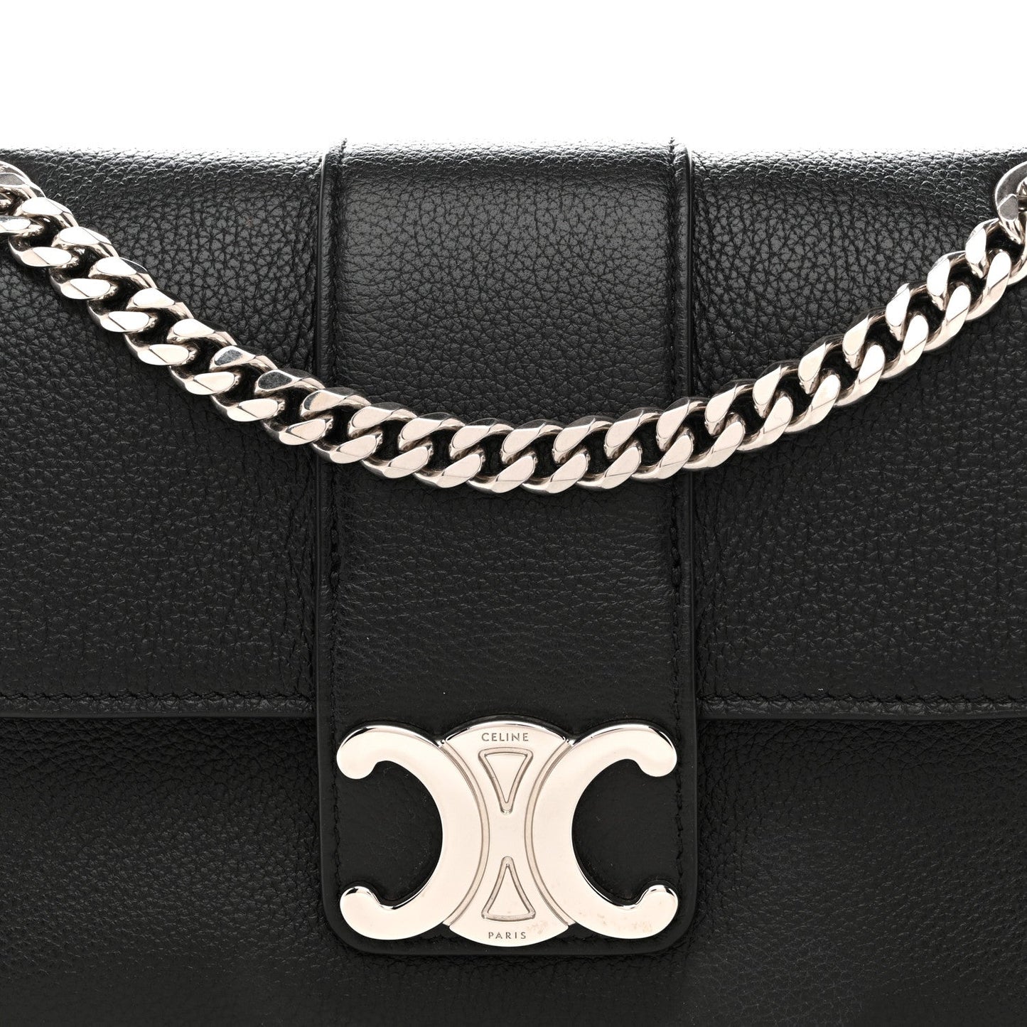 Black leather shoulder bag front with silver C clasp and chain strap