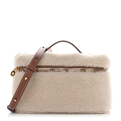 Cream faux-fur calfskin pouch with brown leather strap and gold zipper closure