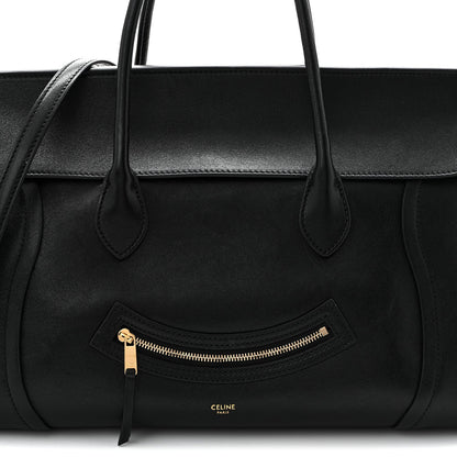Celine black leather tote front with curved zipper pocket and small CELINE logo