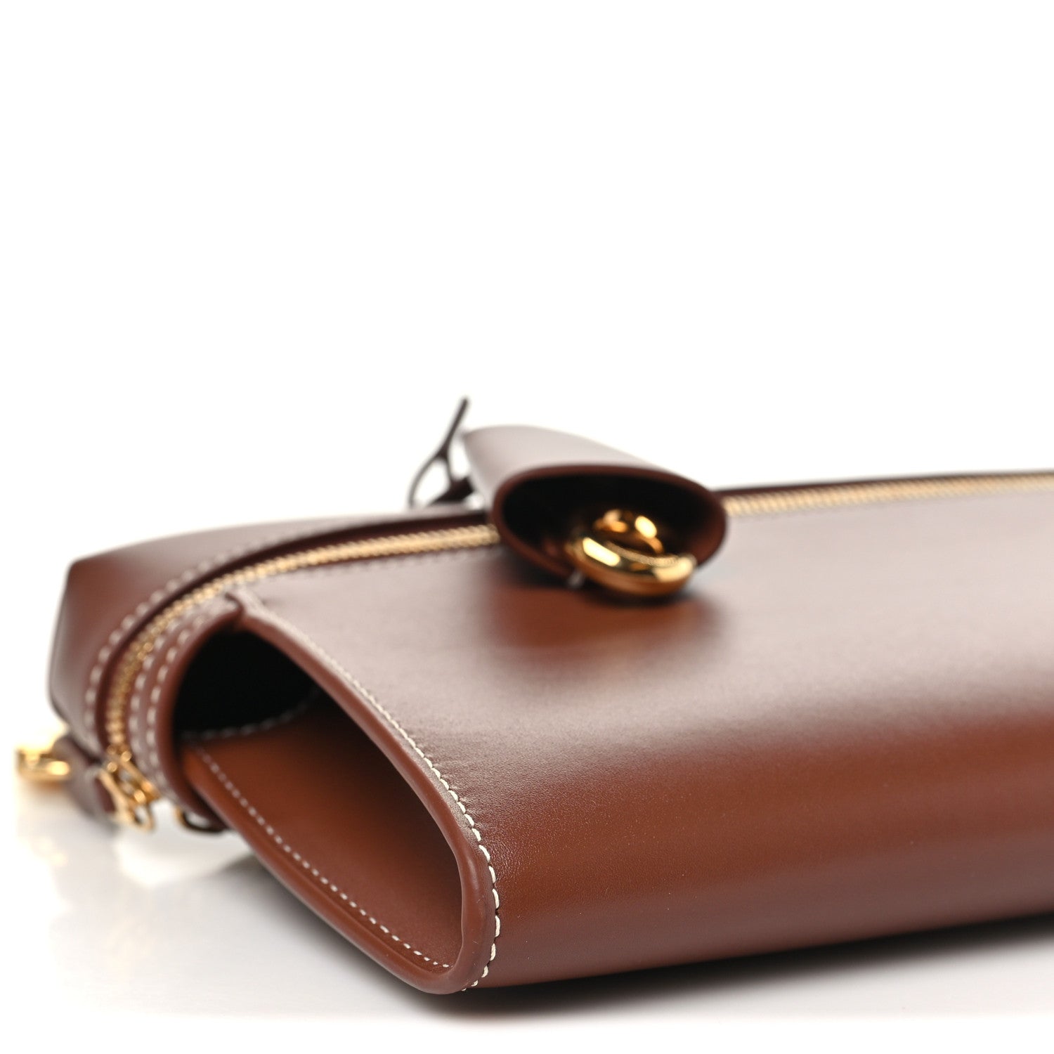 Loro Piana smooth calfskin clutch with open side and gold zipper pull hardware
