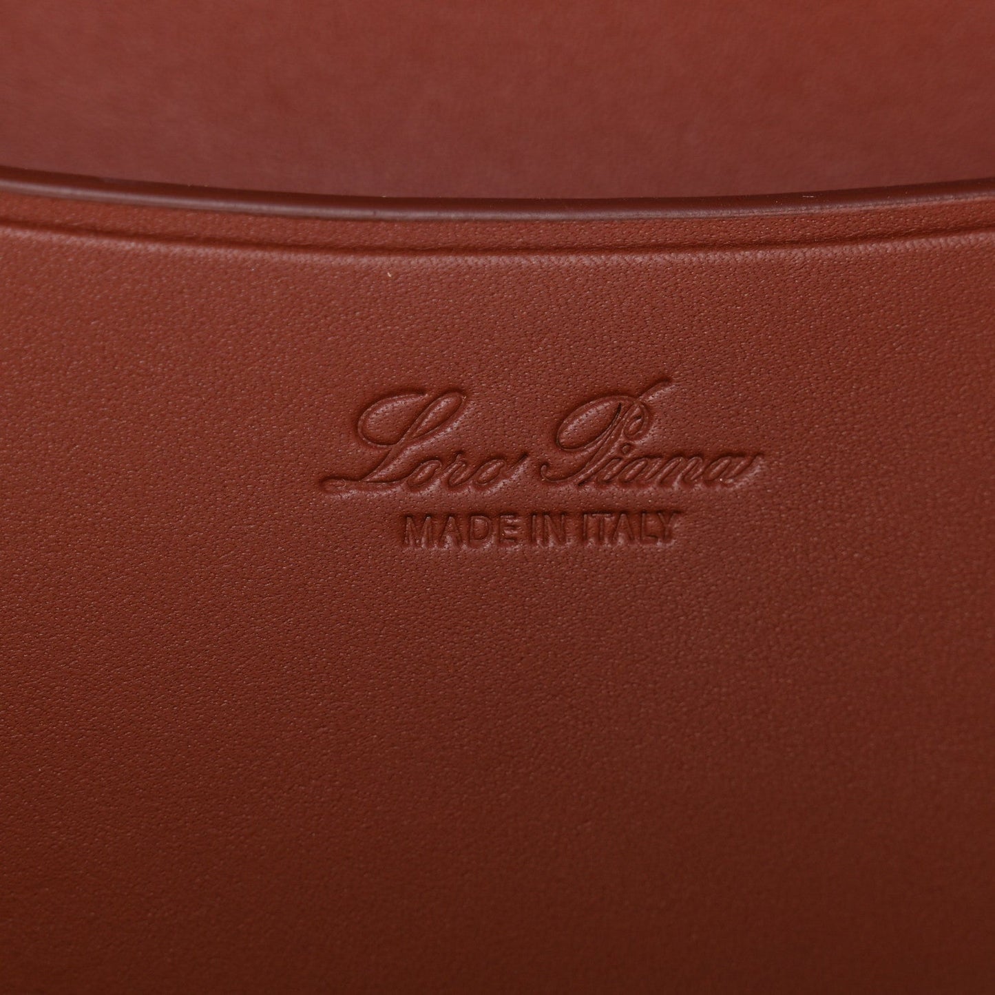 Loro Piana embossing and Made in Italy on dark brown calfskin