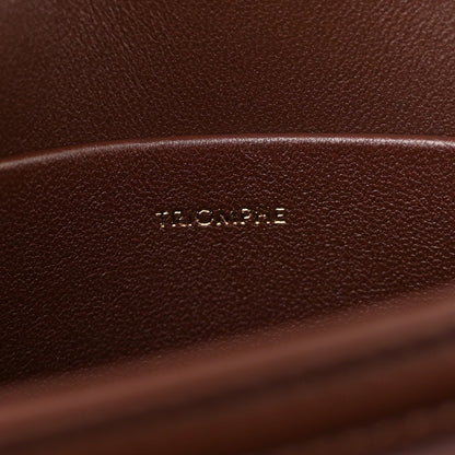 Dark chestnut leather interior with embossed CELINE logo