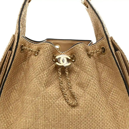 Chanel 25 Handbag in Braided Raffia and Calfskin Beige Black - NEESTRA