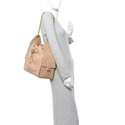 Chanel Caviar Quilted Medium 25 Handbag in Beige Calfskin - NEESTRA