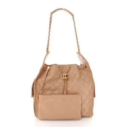 Chanel Caviar Quilted Medium 25 Handbag in Beige Calfskin - NEESTRA