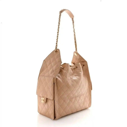 Chanel Caviar Quilted Medium 25 Handbag in Beige Calfskin - NEESTRA