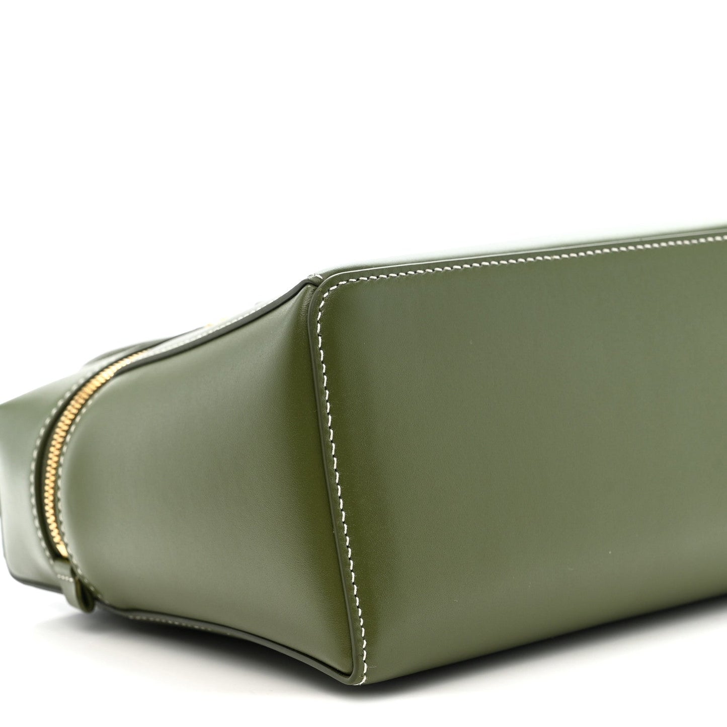 Olive green leather handbag side panel with curved seam and contrast edge stitching