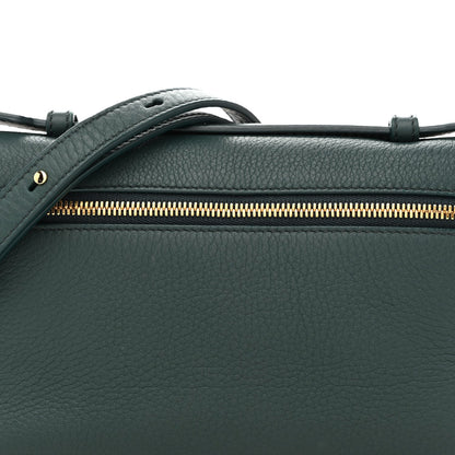 Dark green grained leather pouch with top zipper and leather strap attachment.