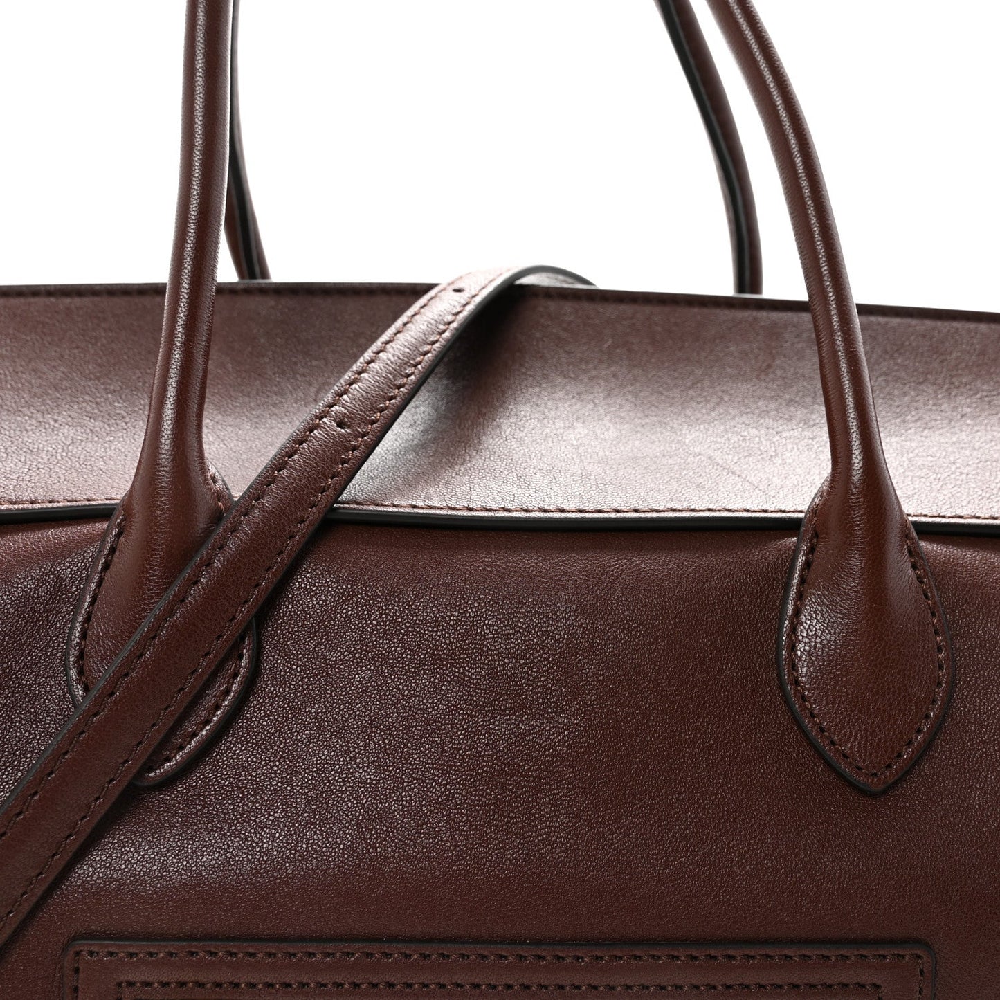 Leather handbag top handle bases with structured opening and stitched leather trim
