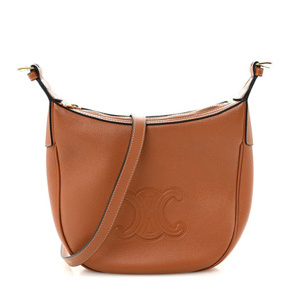Tan leather hobo shoulder bag with embossed C logo and dual shoulder straps