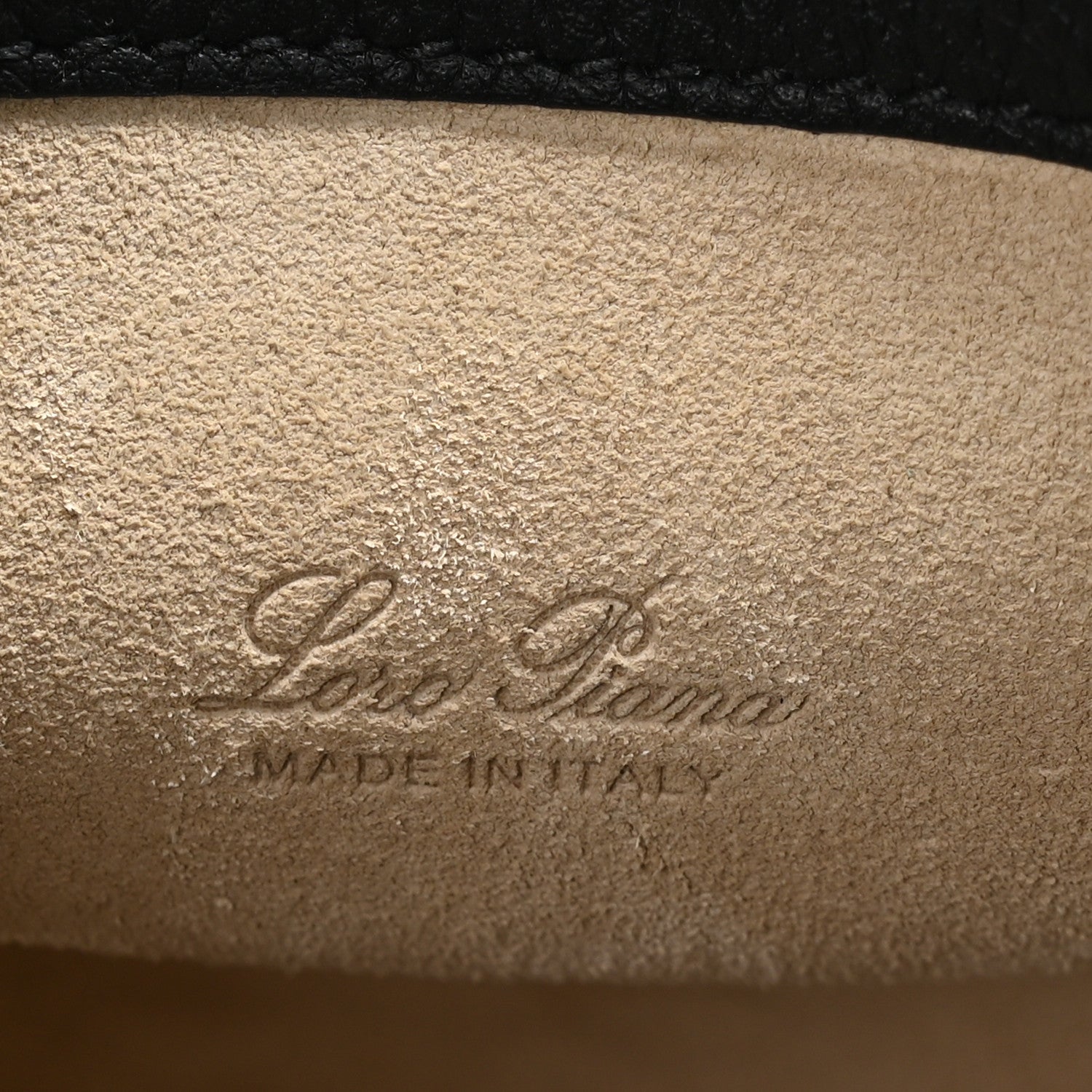 Micro bale bag interior stamp text on tan leather lining