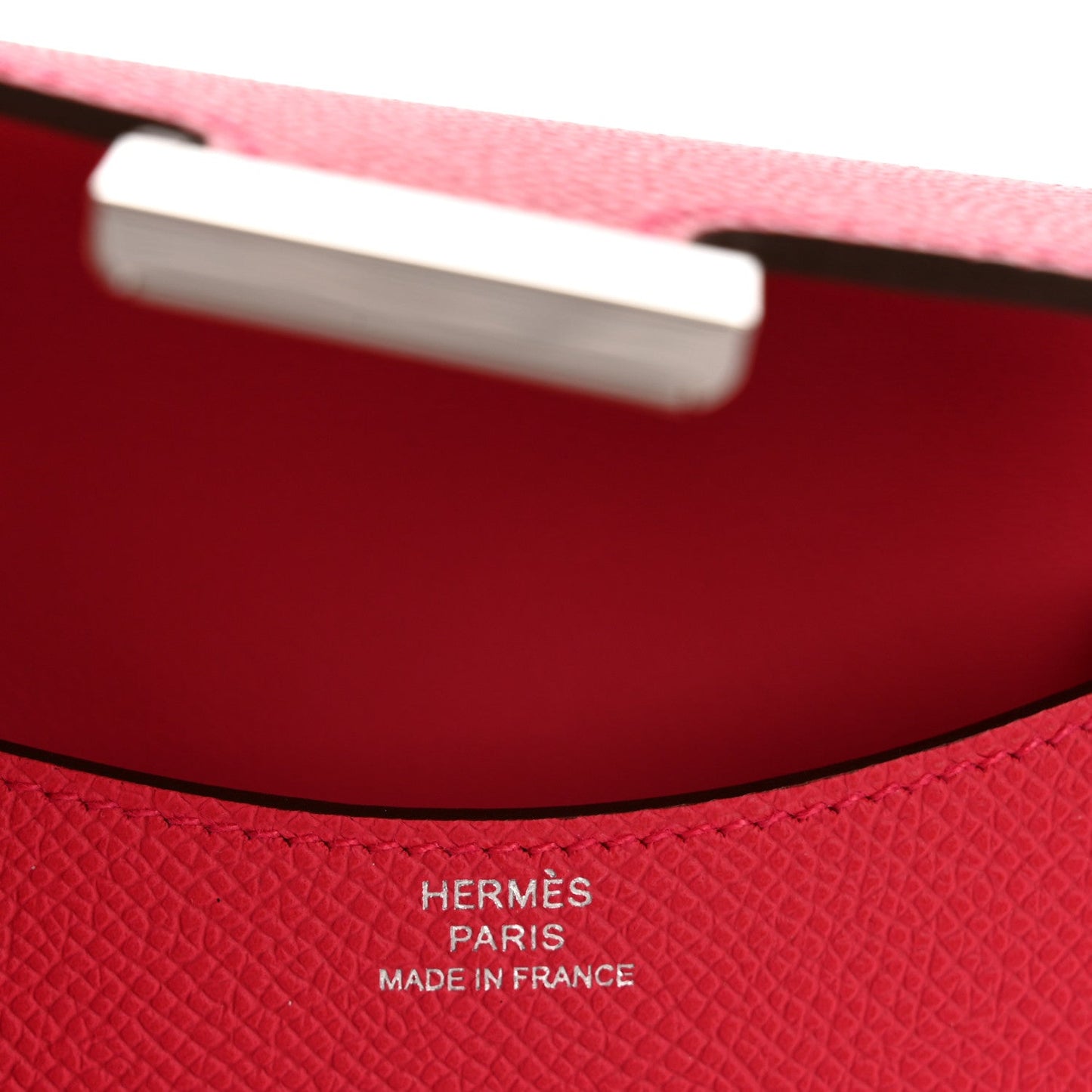 Hermes slim wallet interior lining with stitched detail and H clasp bar