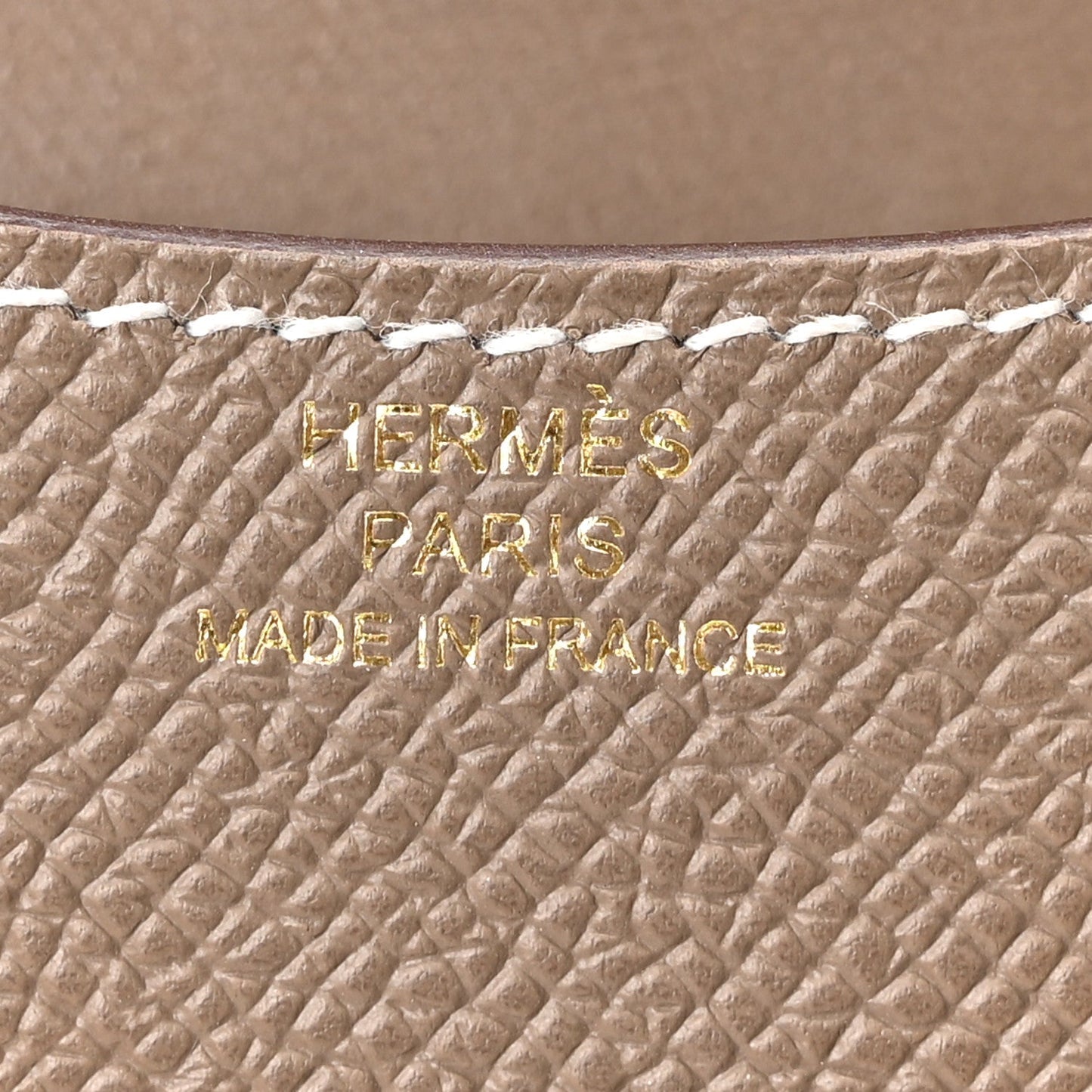 Hermes Paris stamped on etoupe textured leather, Made in France