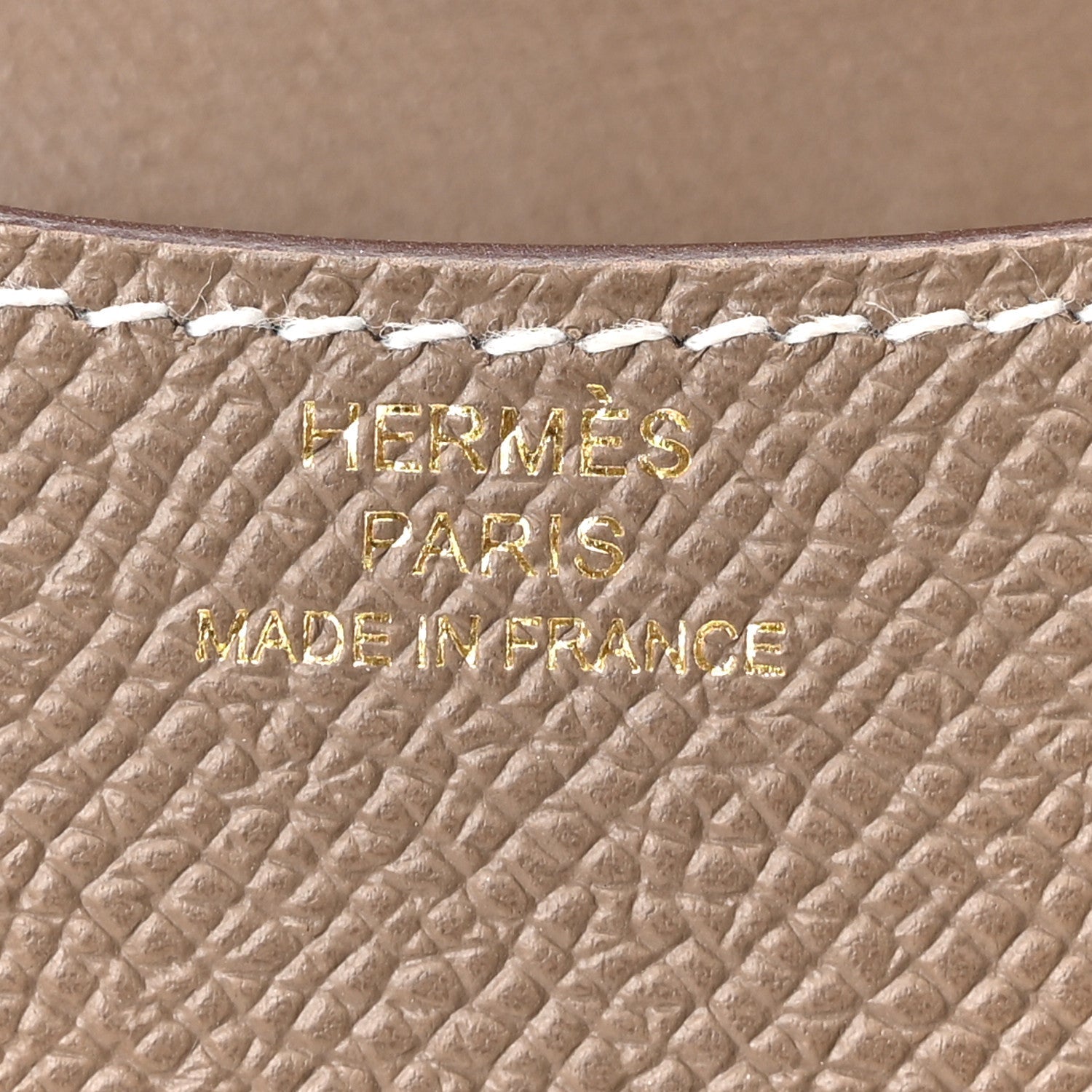 Hermes Paris stamped on etoupe textured leather, Made in France