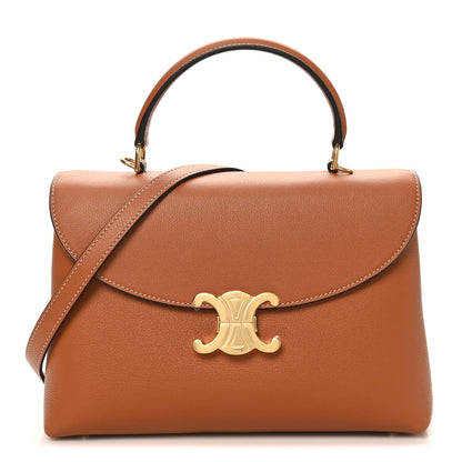 Tan grained calfskin medium handbag with gold logo clasp, top handles, and crossbody strap