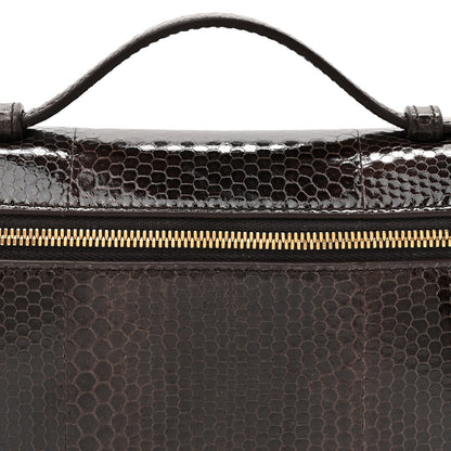 Loro Piana lizard leather pouch top edge with gold zipper and stitched handle attachment