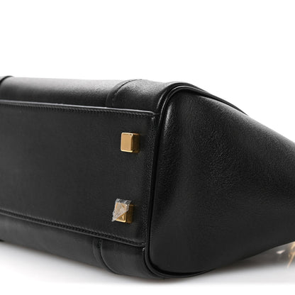 Celine black leather mini tote end panel close-up with gold-tone hardware