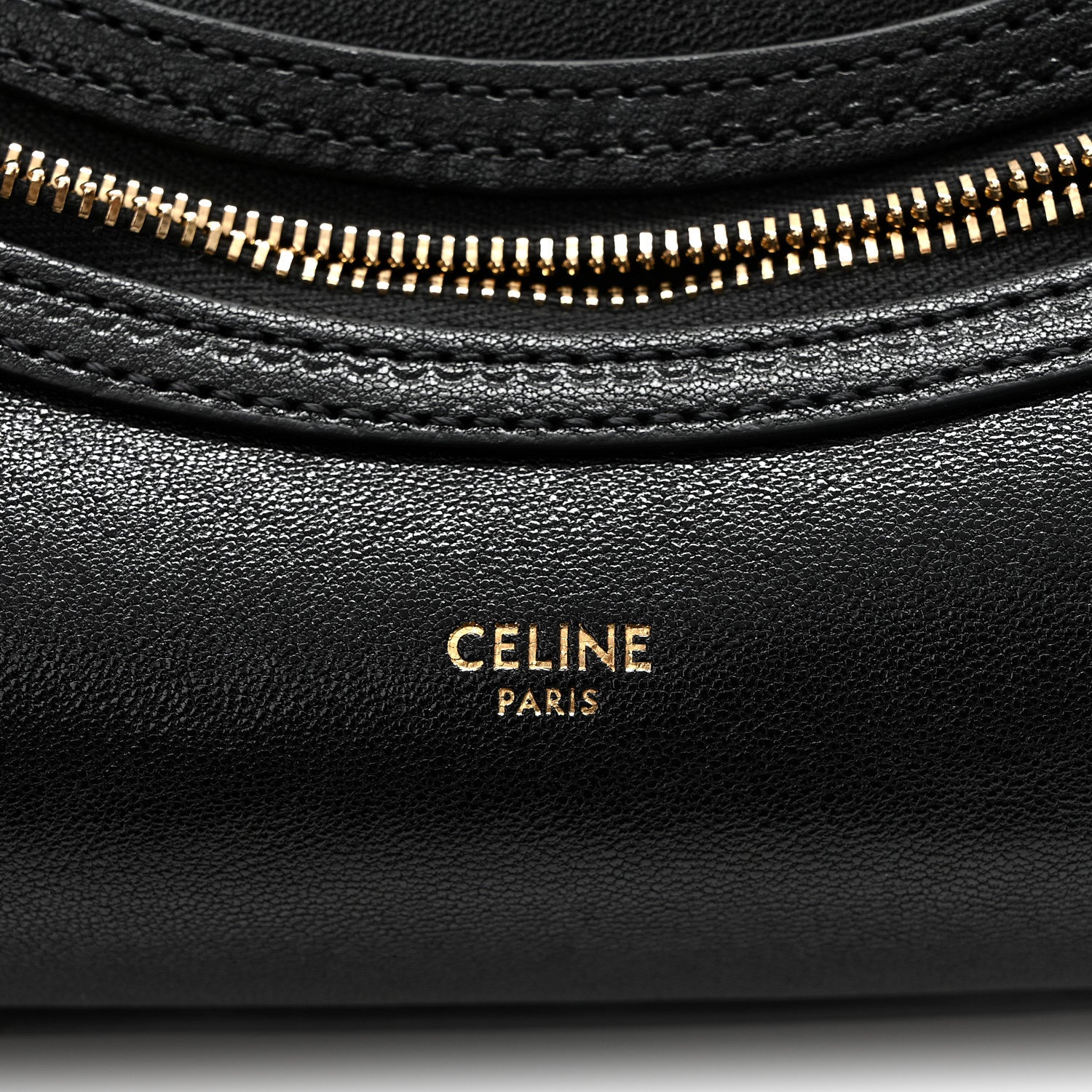 Celine black leather front pocket with gold zipper and CELINE PARIS logo