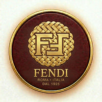 Fendi logo on a round, braided leather patch with gold border