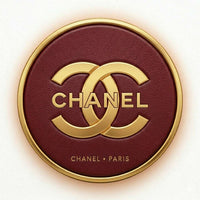 Chanel logo on a round red and gold product with 'Chanel Paris' text.